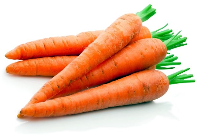 Fresh Carrots Isolated On A White Background